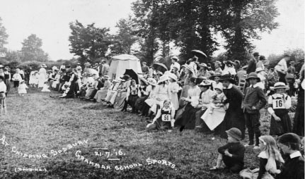A crowd watching a sports day