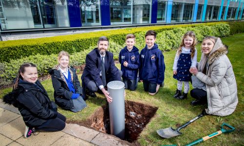 time capsule being buried