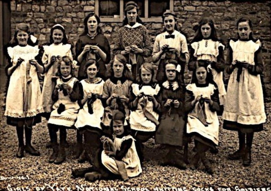 Girls knitting in World War One